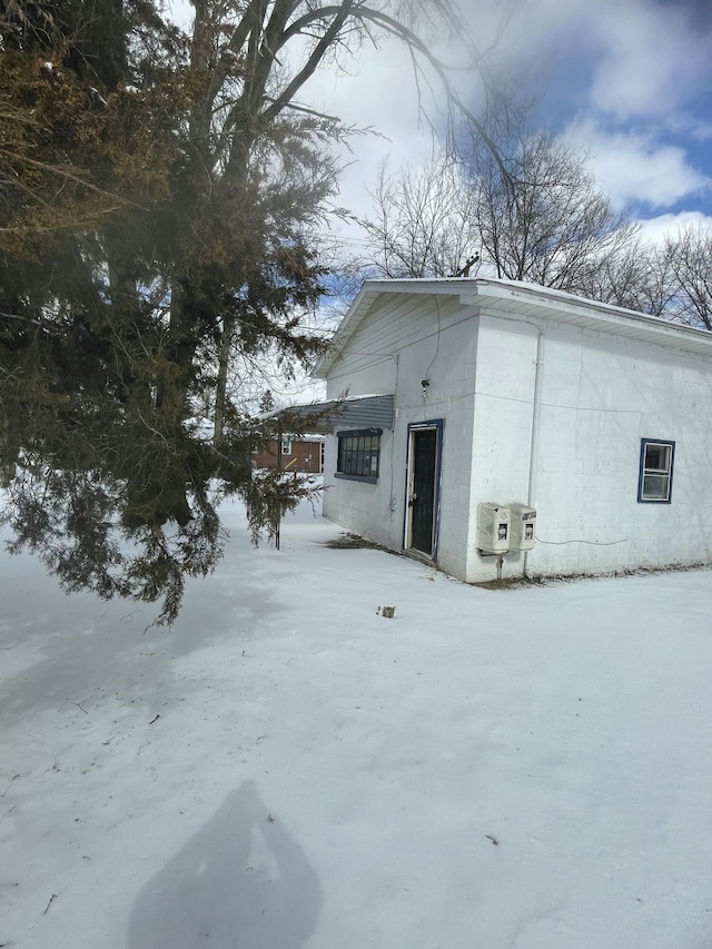 view of snow covered property