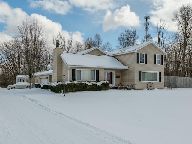 view of front of property featuring a garage