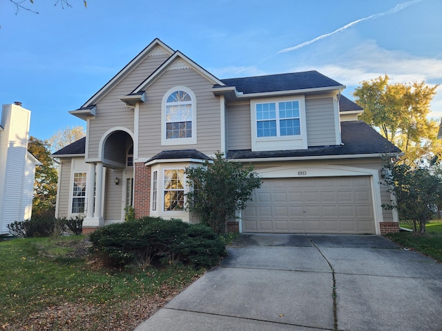 view of front of home with a garage