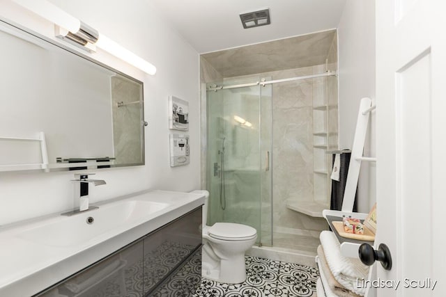 full bathroom with a shower stall, tile patterned floors, visible vents, and toilet