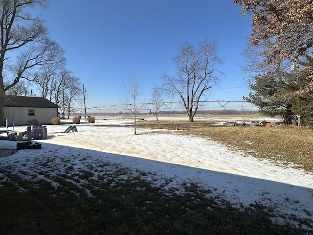 view of yard covered in snow