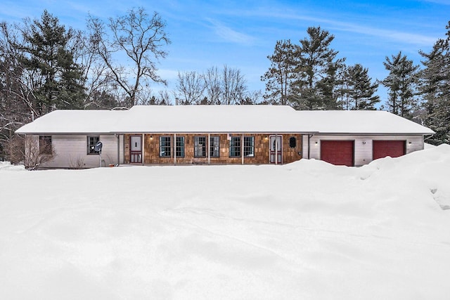 single story home featuring a garage