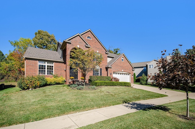 traditional-style home featuring concrete driveway, brick siding, an attached garage, and a front lawn