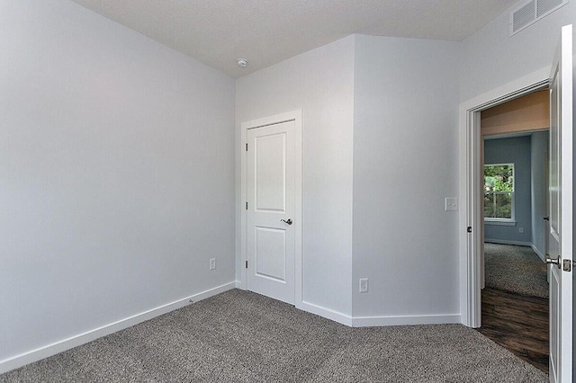 unfurnished bedroom featuring carpet floors