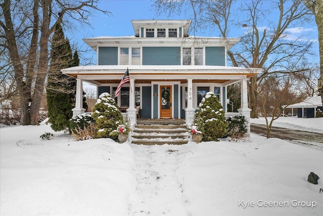 traditional style home featuring covered porch