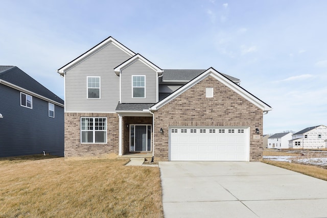 traditional-style house with a garage, brick siding, a shingled roof, driveway, and a front lawn