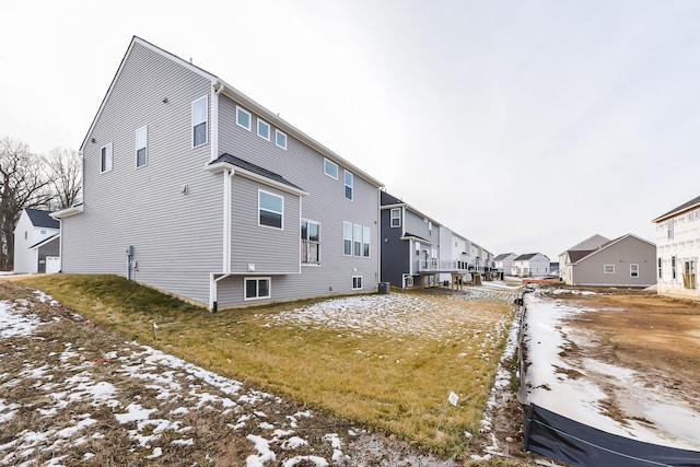 back of property featuring a residential view