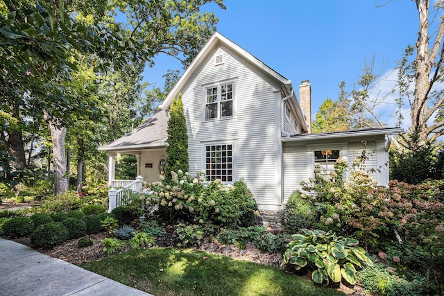 view of home's exterior featuring a porch