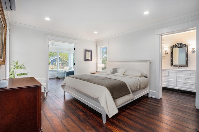 bedroom with crown molding, ensuite bath, and dark hardwood / wood-style flooring