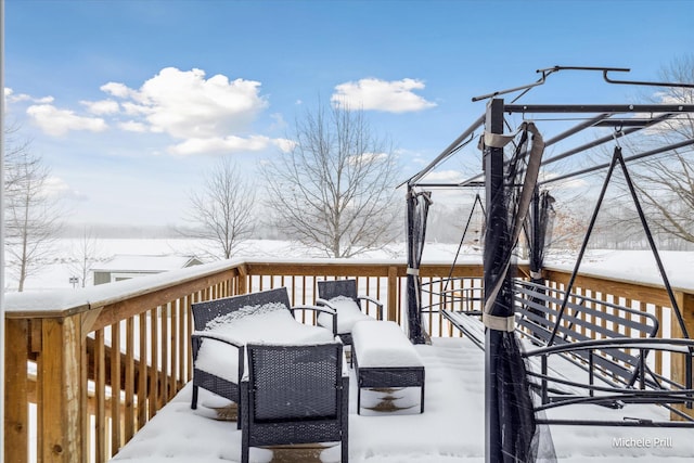 view of snow covered deck