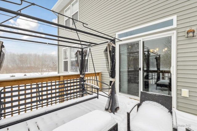 view of snow covered patio