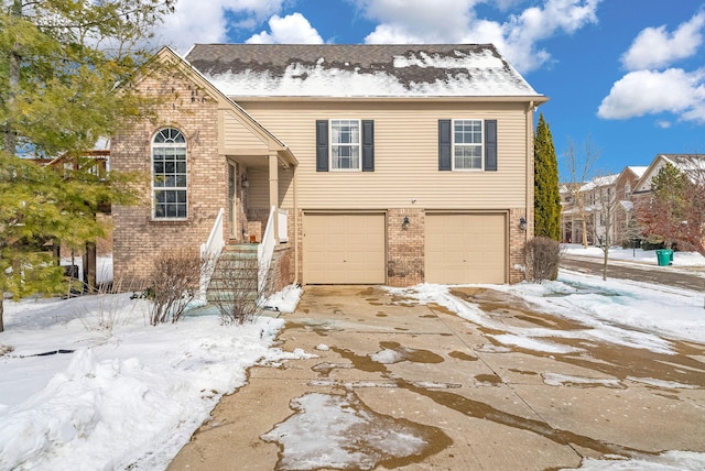 view of front of home with a garage