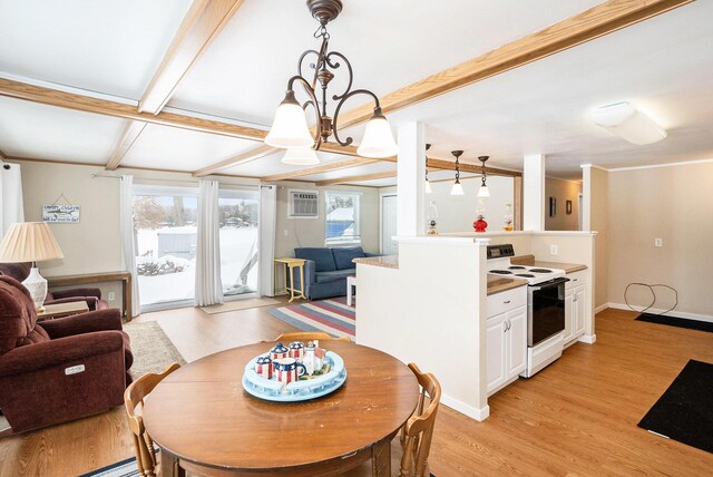 5274 N Bahr Dr Unit 14, Irons, MI 49644 - dining space featuring light wood-type flooring, beamed ceiling, a chandelier, and baseboards