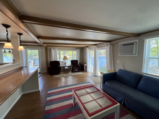 5274 N Bahr Dr Unit 14, Irons, MI 49644 - living room featuring beamed ceiling, plenty of natural light, a wall unit AC, wood finished floors, and baseboards