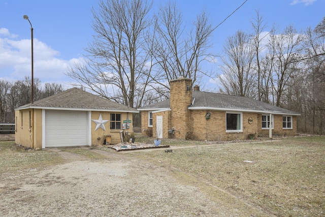 single story home featuring a garage