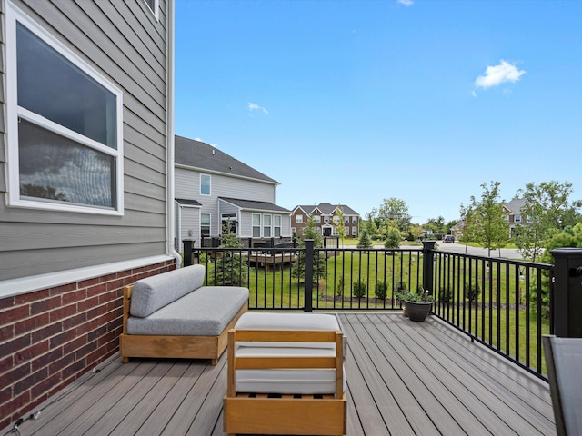 wooden terrace with a residential view