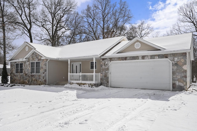 ranch-style house featuring stone siding, covered porch, and an attached garage