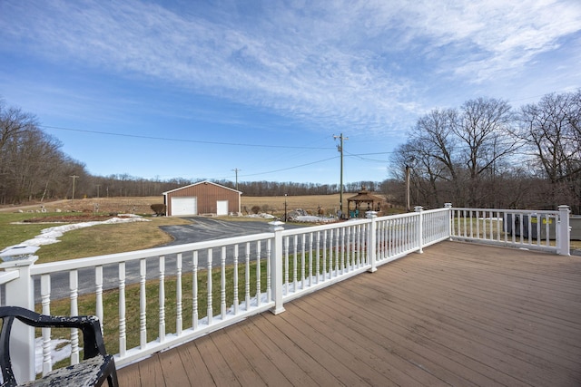 wooden terrace with an outdoor structure