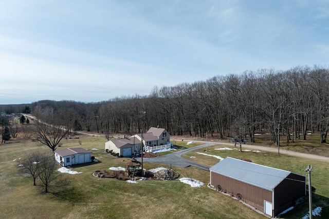 bird's eye view featuring a view of trees