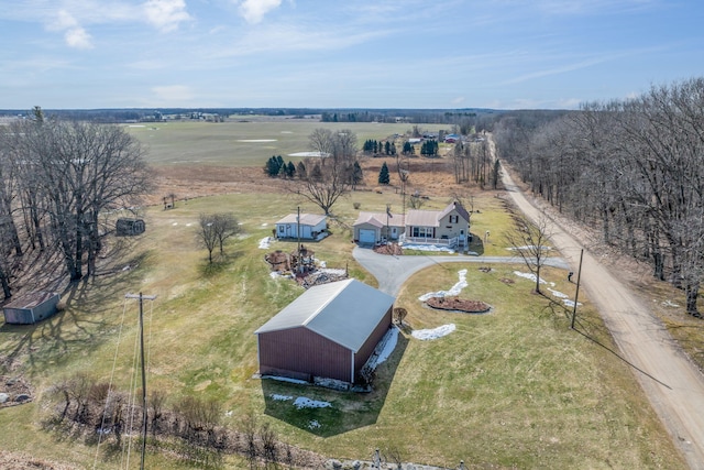 birds eye view of property featuring a rural view