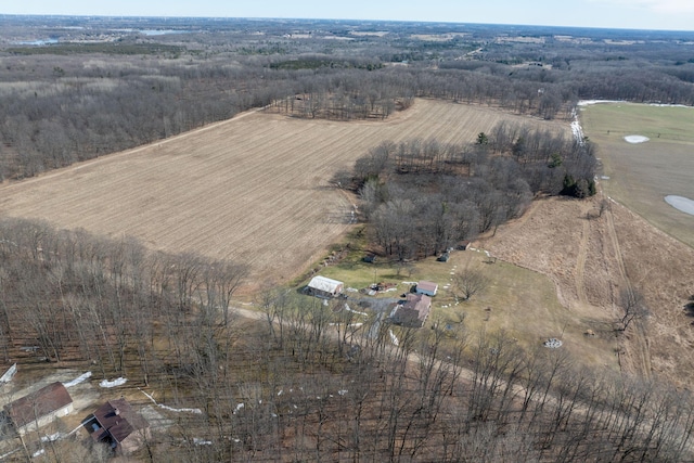 birds eye view of property with a rural view