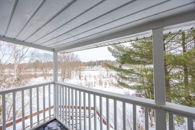 view of snow covered deck