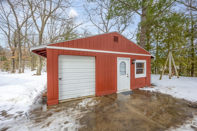 view of snow covered garage