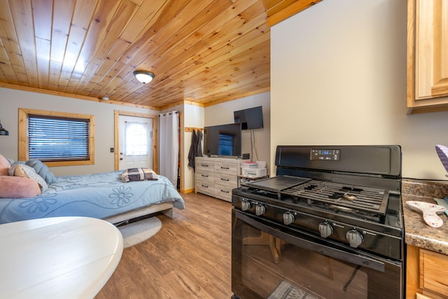 bedroom with light wood-type flooring and wood ceiling