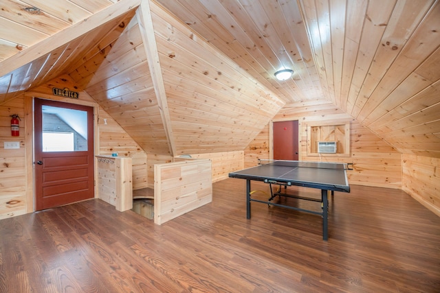 recreation room featuring vaulted ceiling, wooden ceiling, wood finished floors, and wooden walls