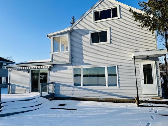 view of snow covered property