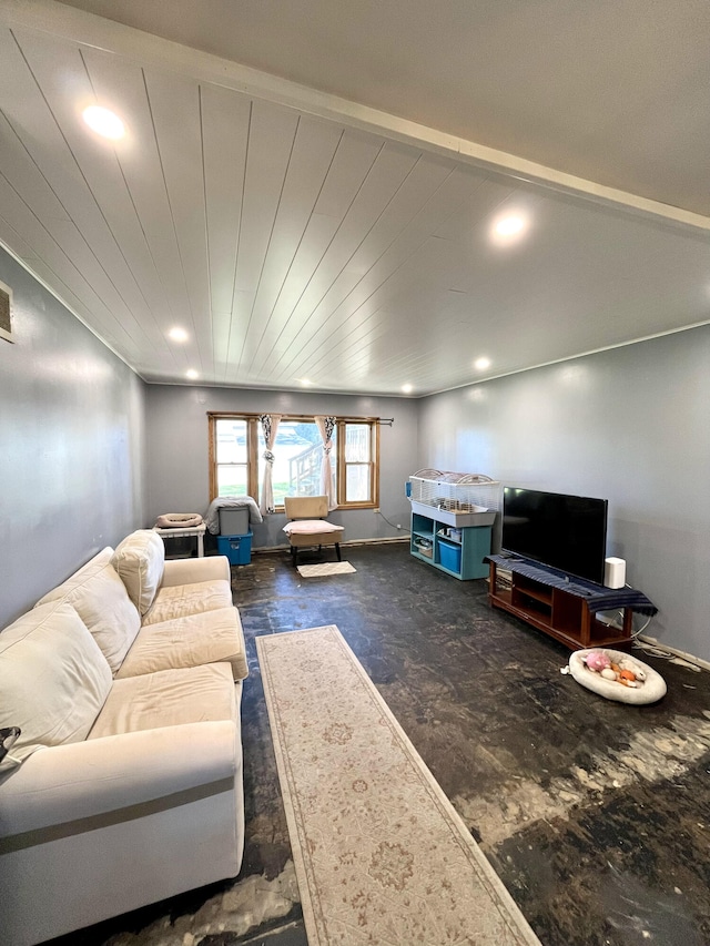 living area featuring baseboards, visible vents, and recessed lighting