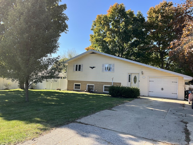 view of property exterior with driveway, a garage, fence, and a yard