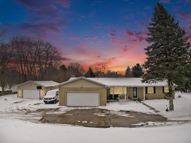 single story home featuring an attached garage