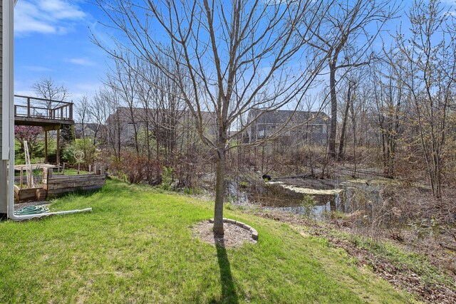4588 Gordonshire NW, Grand Rapids, MI 49534 - view of yard with a deck