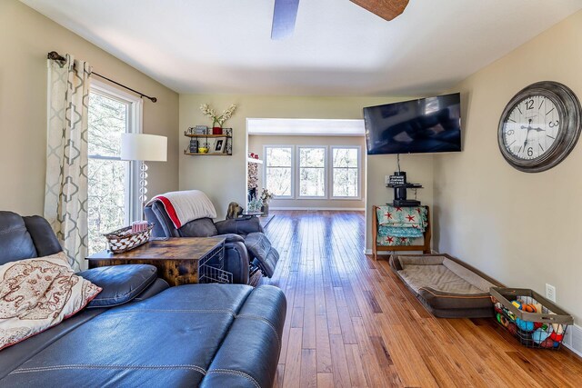 7504 Wiczer Dr, Whitehall, MI 49461 - living area with hardwood / wood-style flooring and a ceiling fan