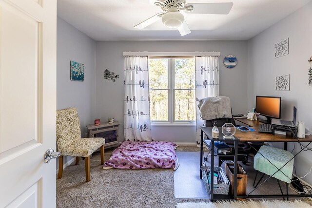 7504 Wiczer Dr, Whitehall, MI 49461 - carpeted home office with a ceiling fan and baseboards