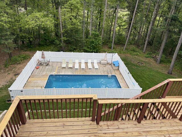 7504 Wiczer Dr, Whitehall, MI 49461 - view of swimming pool featuring a deck