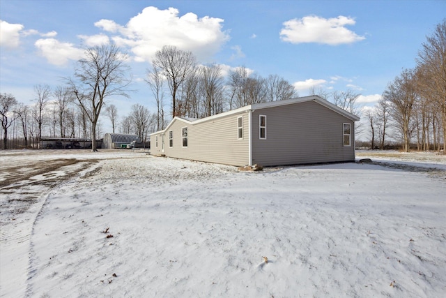 view of snow covered property