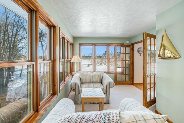 sunroom featuring french doors