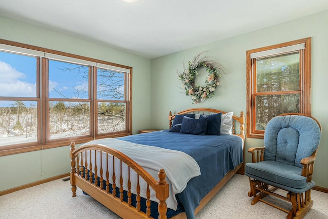 bedroom with carpet, visible vents, and baseboards