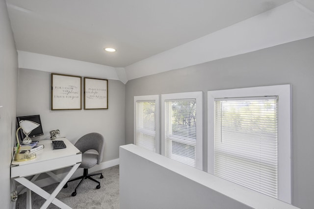 home office with recessed lighting, light carpet, vaulted ceiling, and baseboards