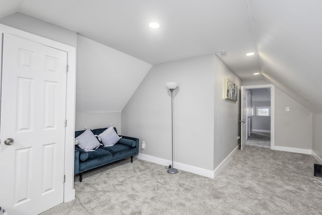 bonus room with light carpet, vaulted ceiling, recessed lighting, and baseboards