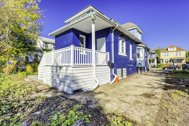 view of side of property with a residential view