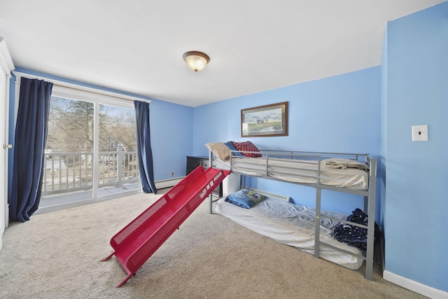 carpeted bedroom featuring a baseboard radiator, access to outside, and baseboards