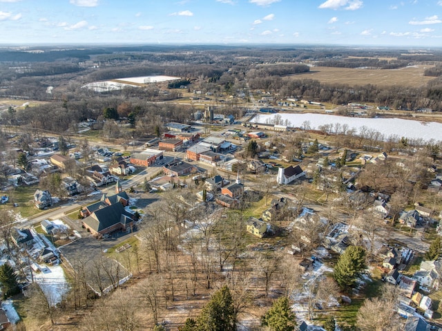 drone / aerial view featuring a residential view and a water view