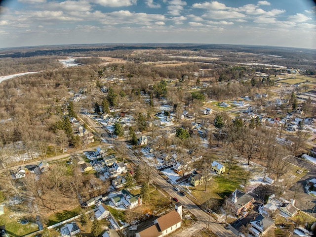 birds eye view of property with a residential view