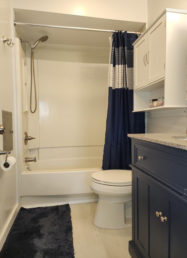 bathroom with vanity, toilet, and shower / bathtub combination with curtain