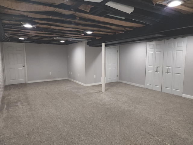 finished basement with carpet and baseboards