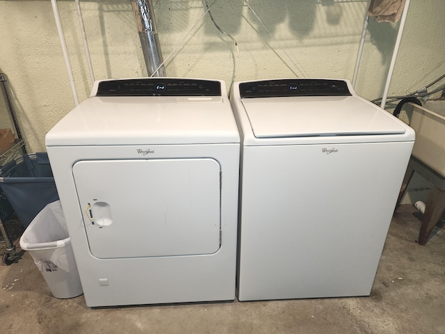 laundry room featuring laundry area and separate washer and dryer