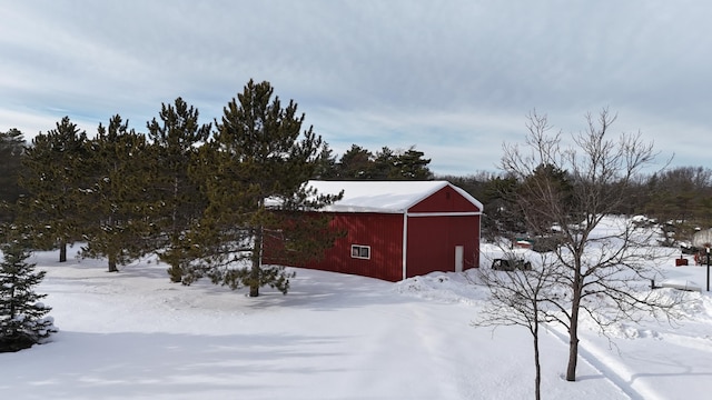 exterior space with an outbuilding and a pole building